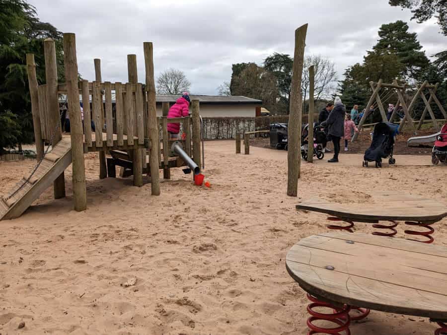 Small climbing frame and other play equipment in a sand pit
