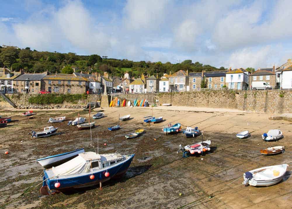 Boats in a harbour when the tide is low