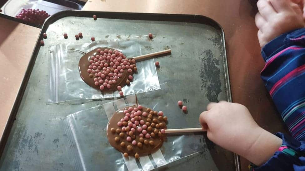 Making chocolate lollies at York's chocolate stor