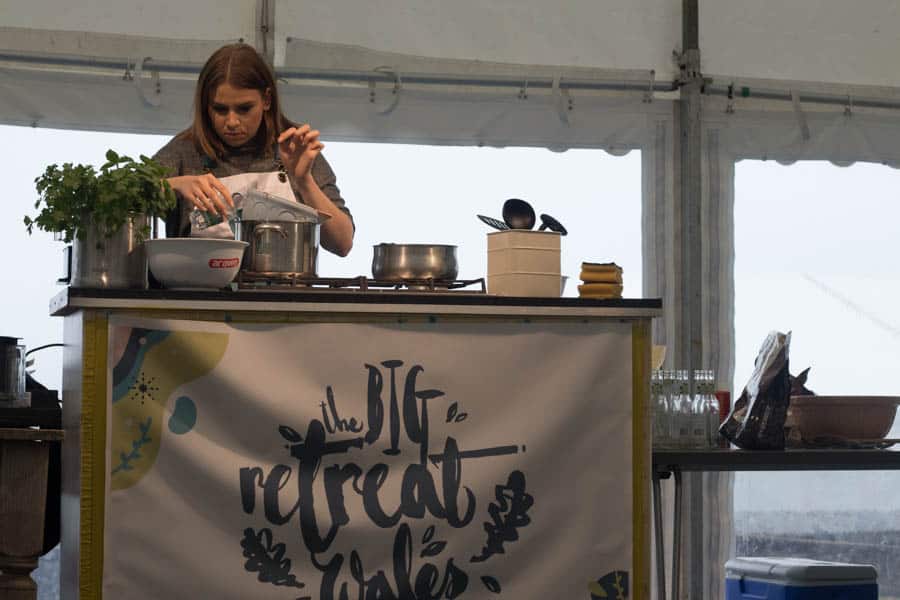 Lady demonstrating making chocolates