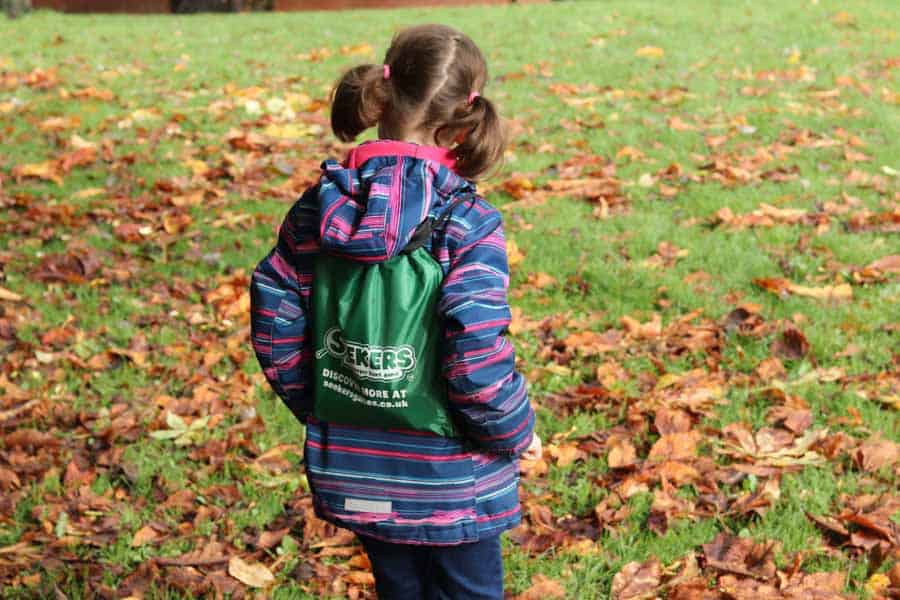 Child with seekers backpack