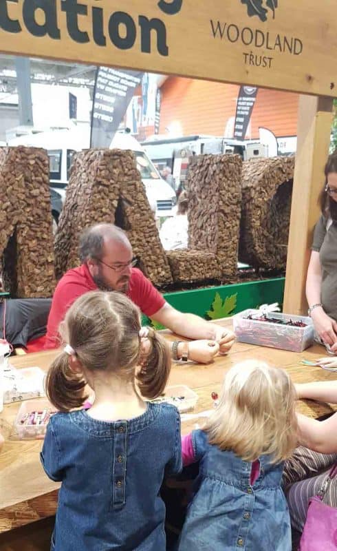 Back of 2 girls crafting