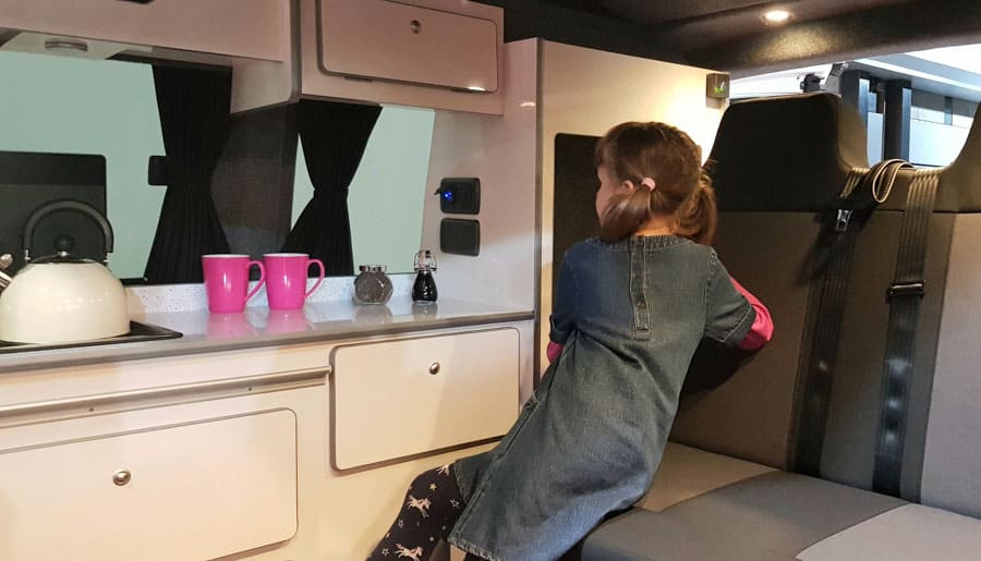 Child inside a campervan