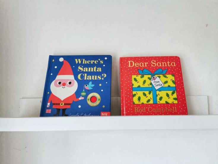 Christmas books for babies on a shelf