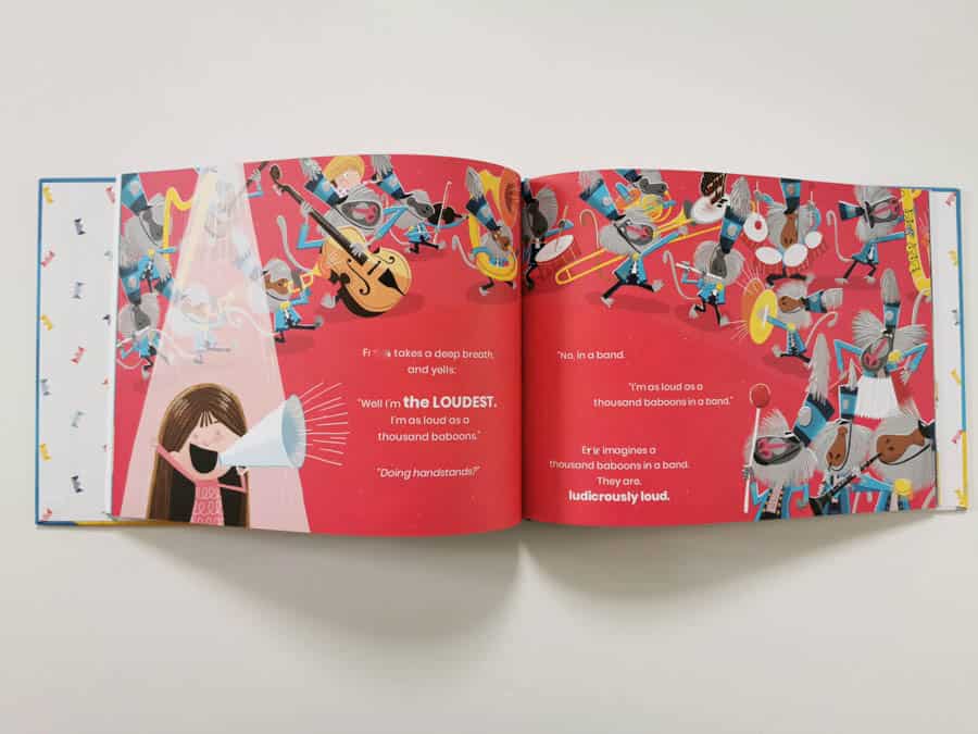 Children's book open with a red page of illustrations f animals in a band