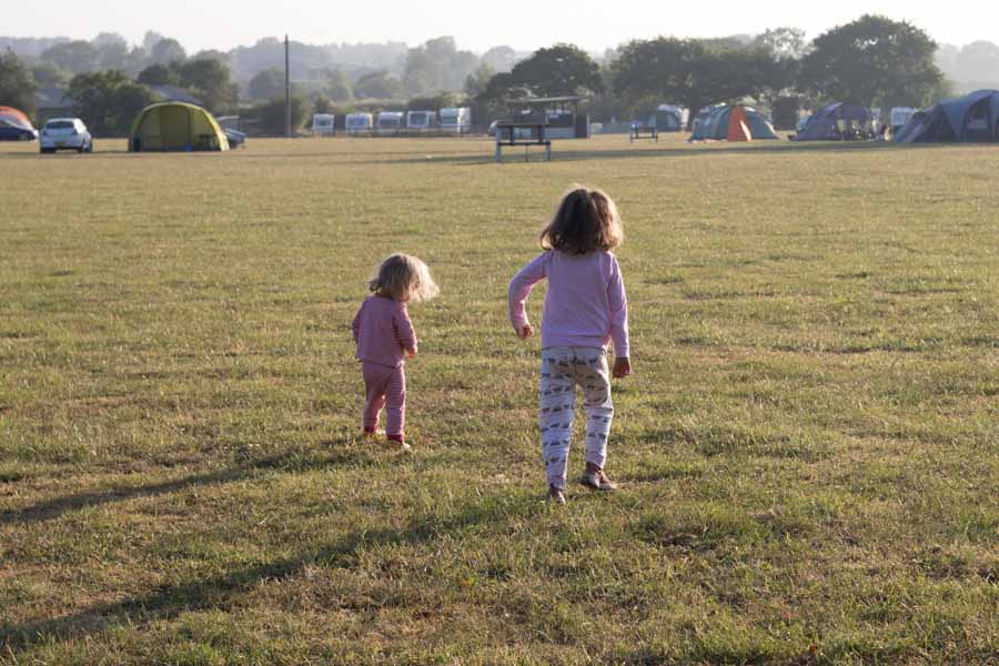 young children on campsite in pj's