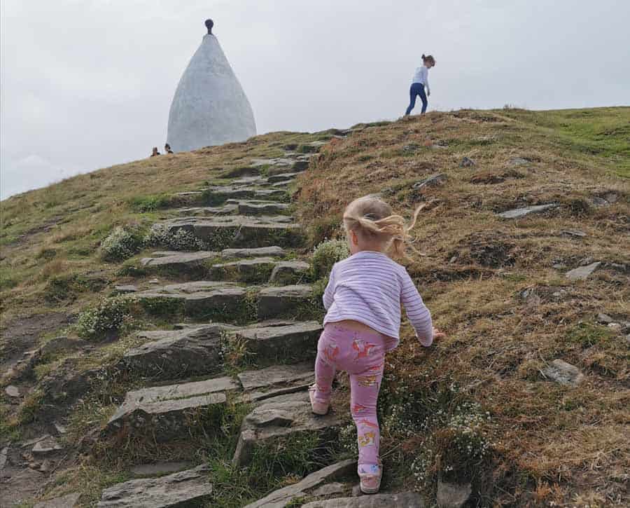Children climbing steep hill upto White Nancy