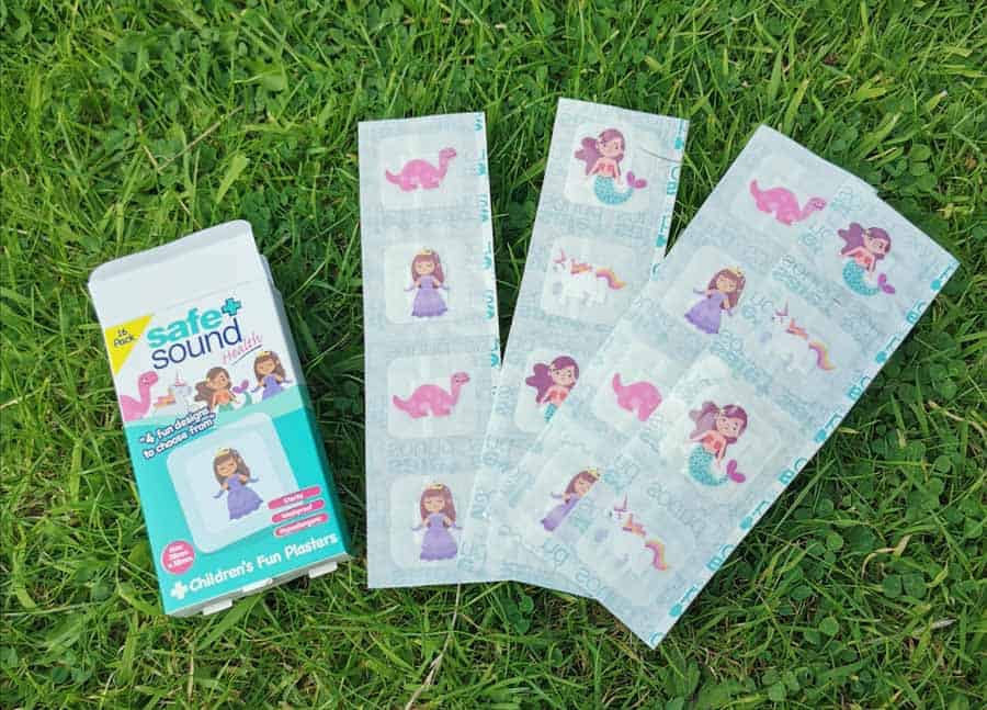 Children's fun plasters on grass