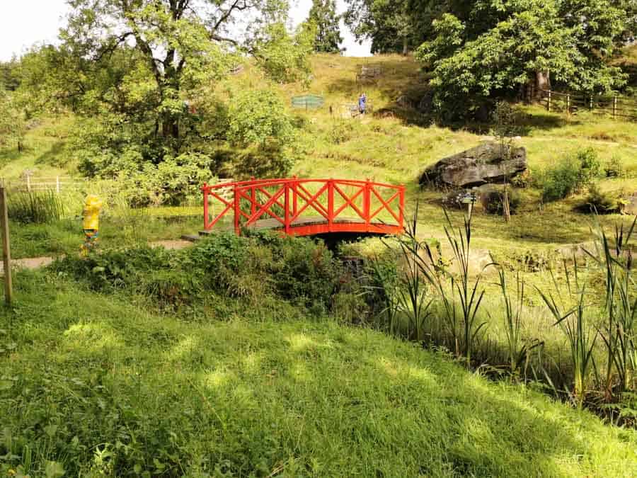 Oriental red bridge over a lake