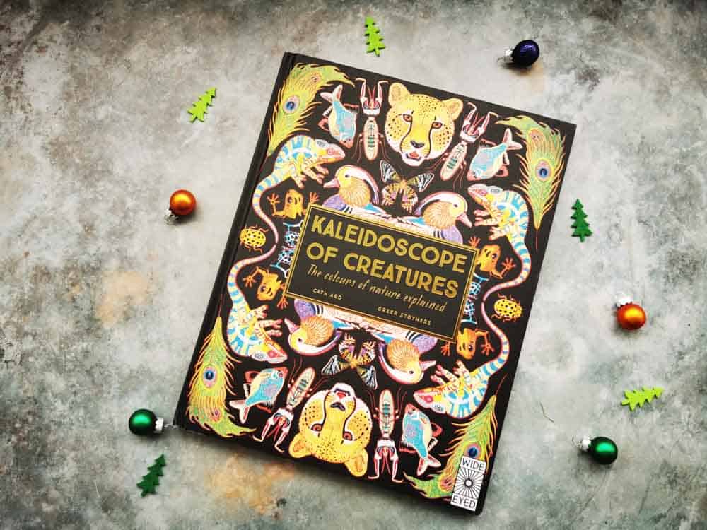 Colourful animal book on a stone background