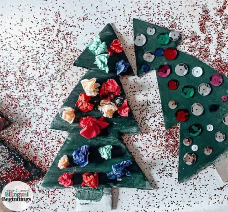 Christmas tree shaped cards covered in sequins or screwed up tissue paper