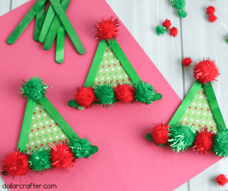 Elf hats made from green lolly sticks and red and green pom poms