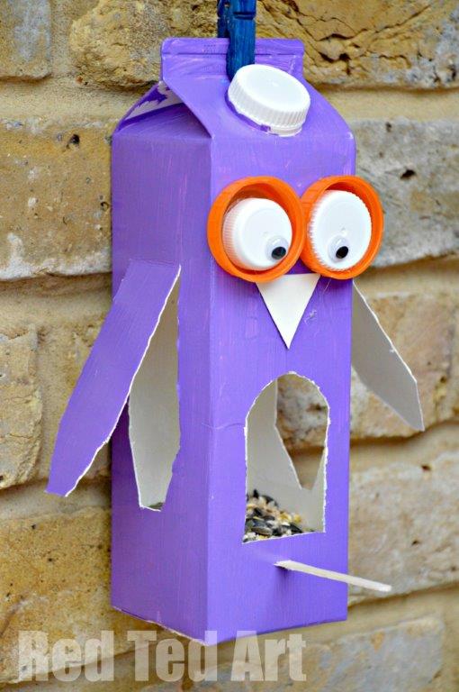 Juice carton, painted purple and crafted into an owl