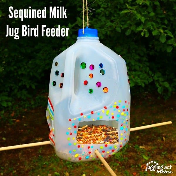 Milk bottle decorated and filled with seeds