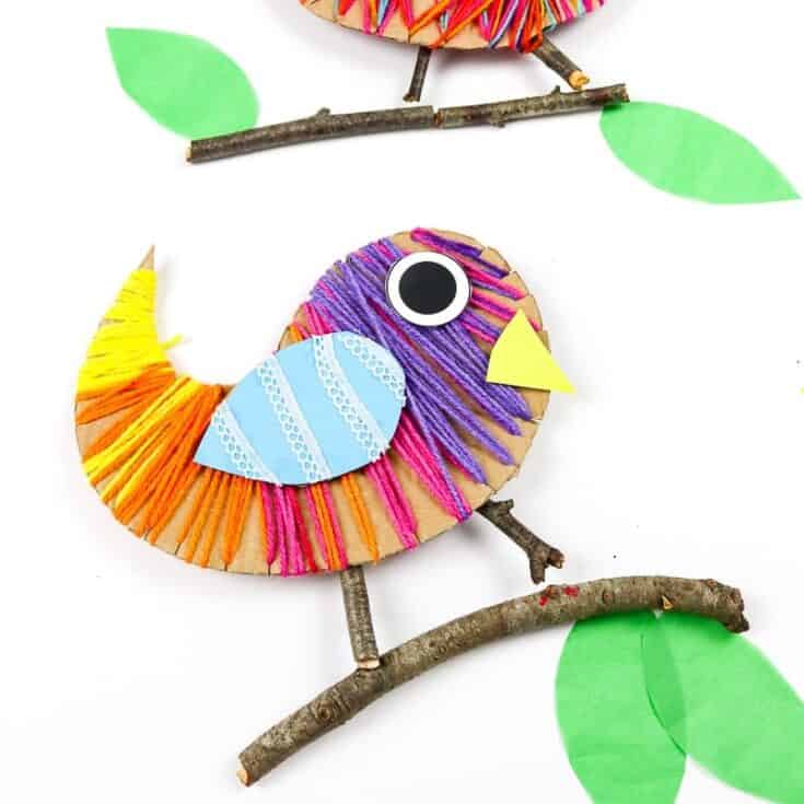 Cardboad bird wrapped in brightly coloured yarn
