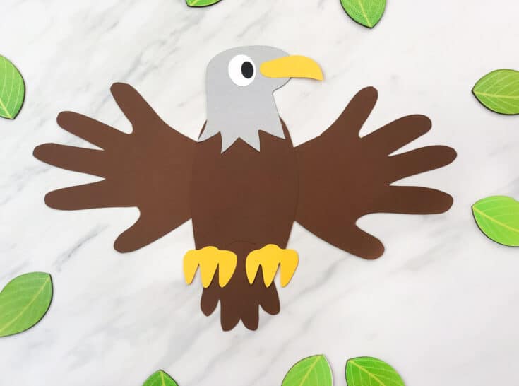 Eagle made out of grey and brown card