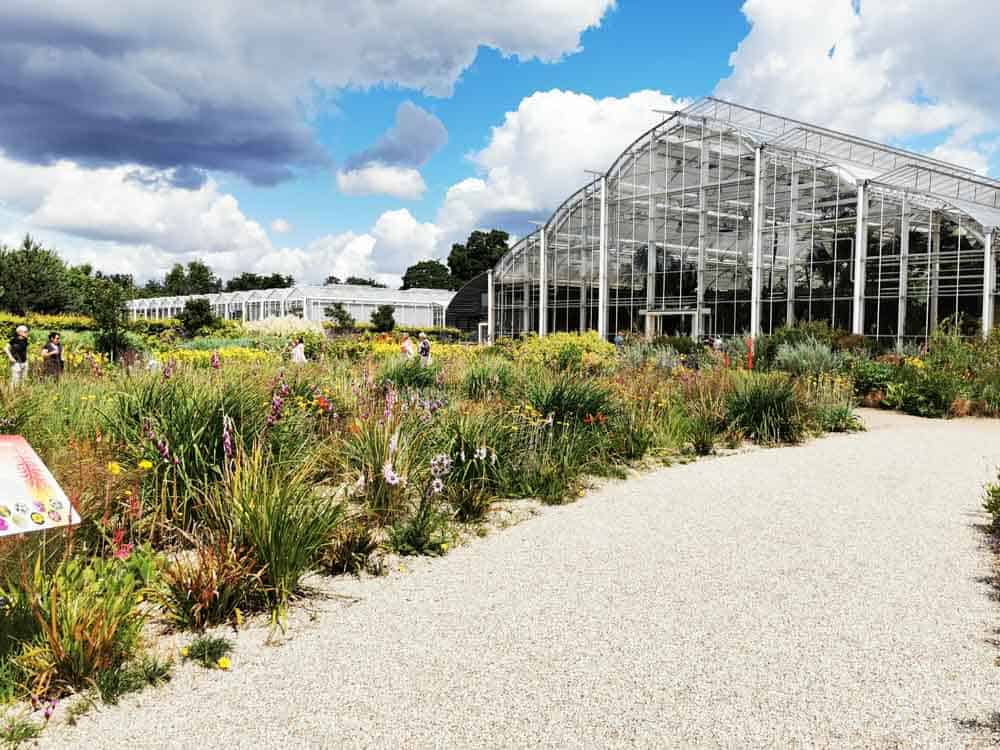 Outside of a large glasshouse at Wisley