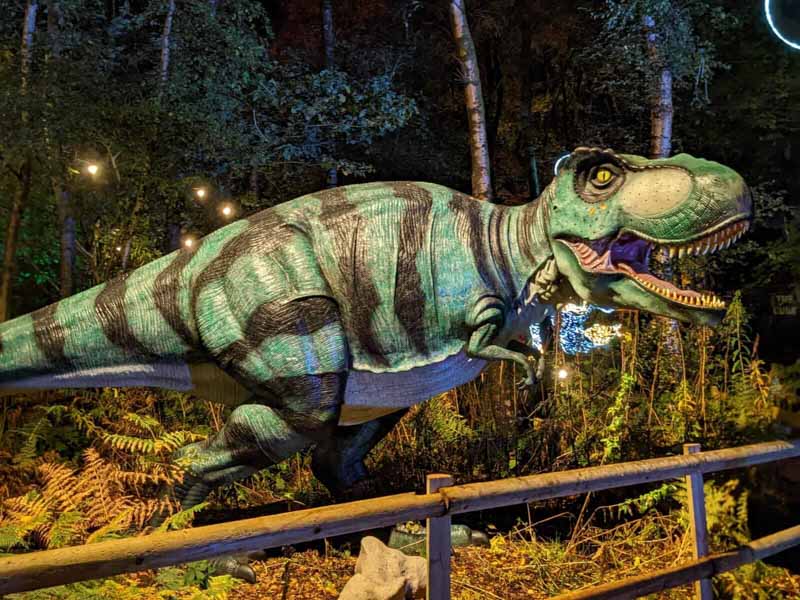 Giant dinosaur scultupre in the dark