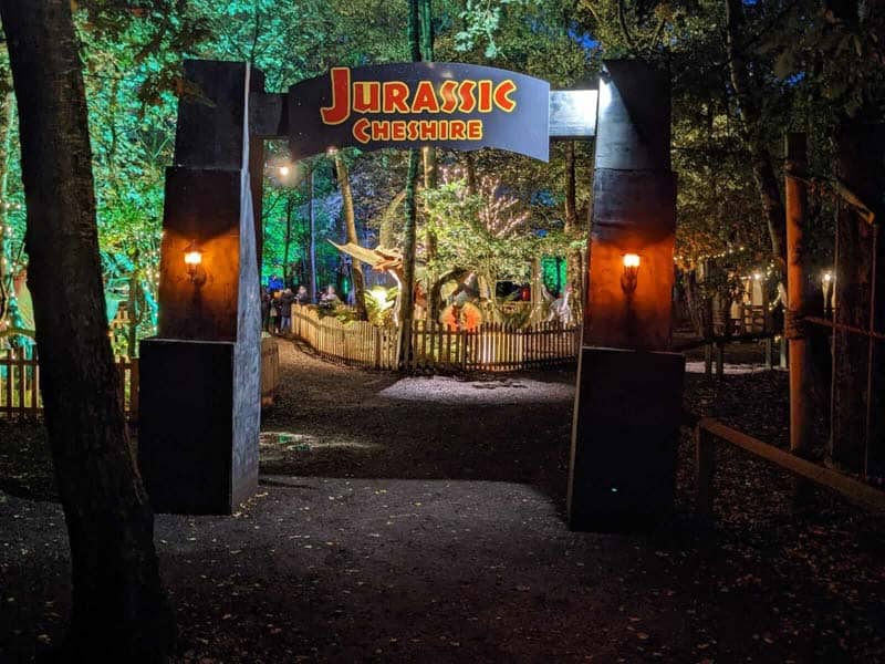 Jurassic cheshire sign in the woods