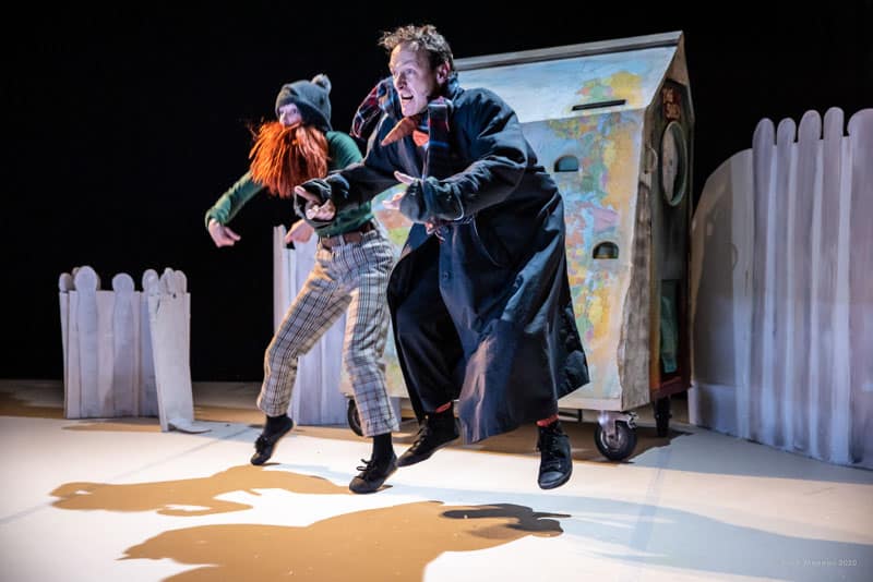 Man and lady on stage jumping