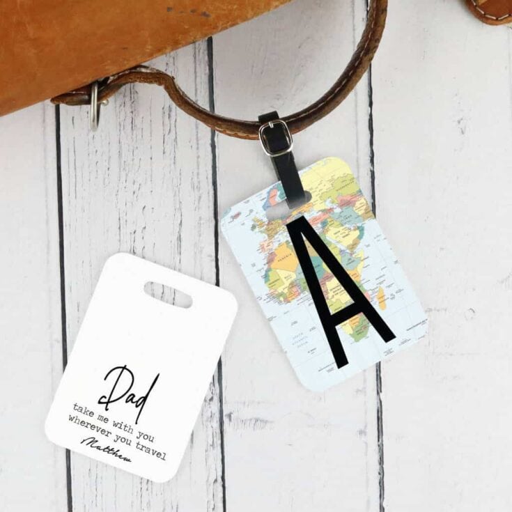 Luggage tag with a world map and a letter A