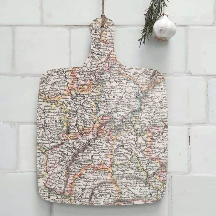 Chopping board with vintage map on it