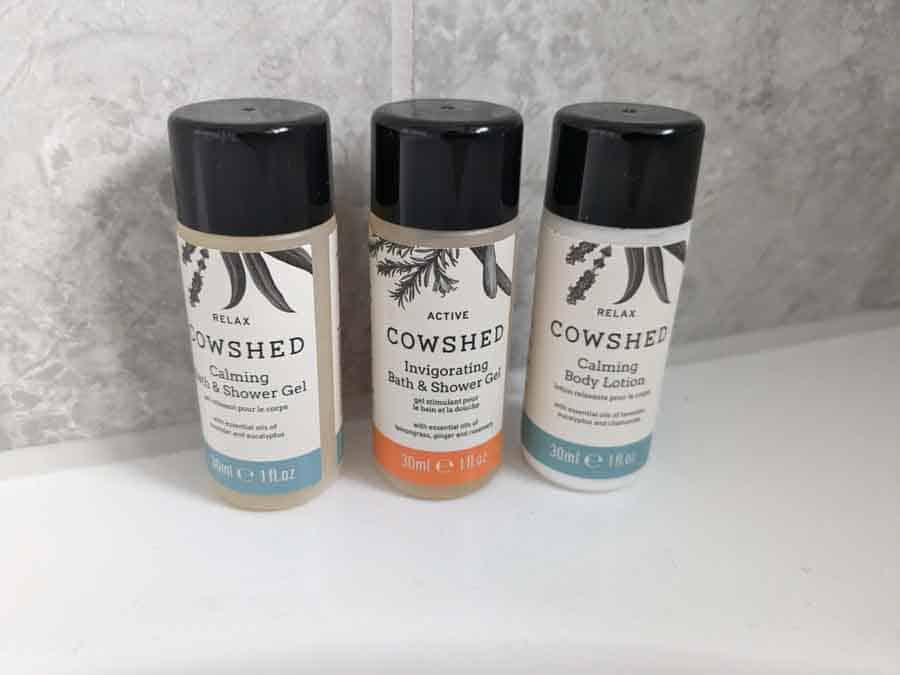 three small bottles of shower gel