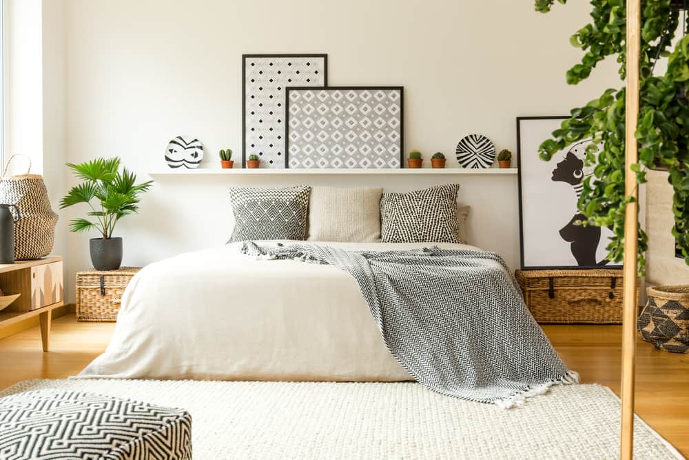 Bedroom with plants and art