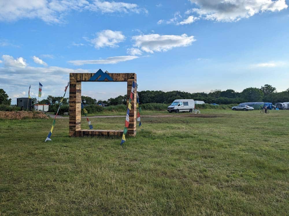 Large wooden frame in middle of campsite