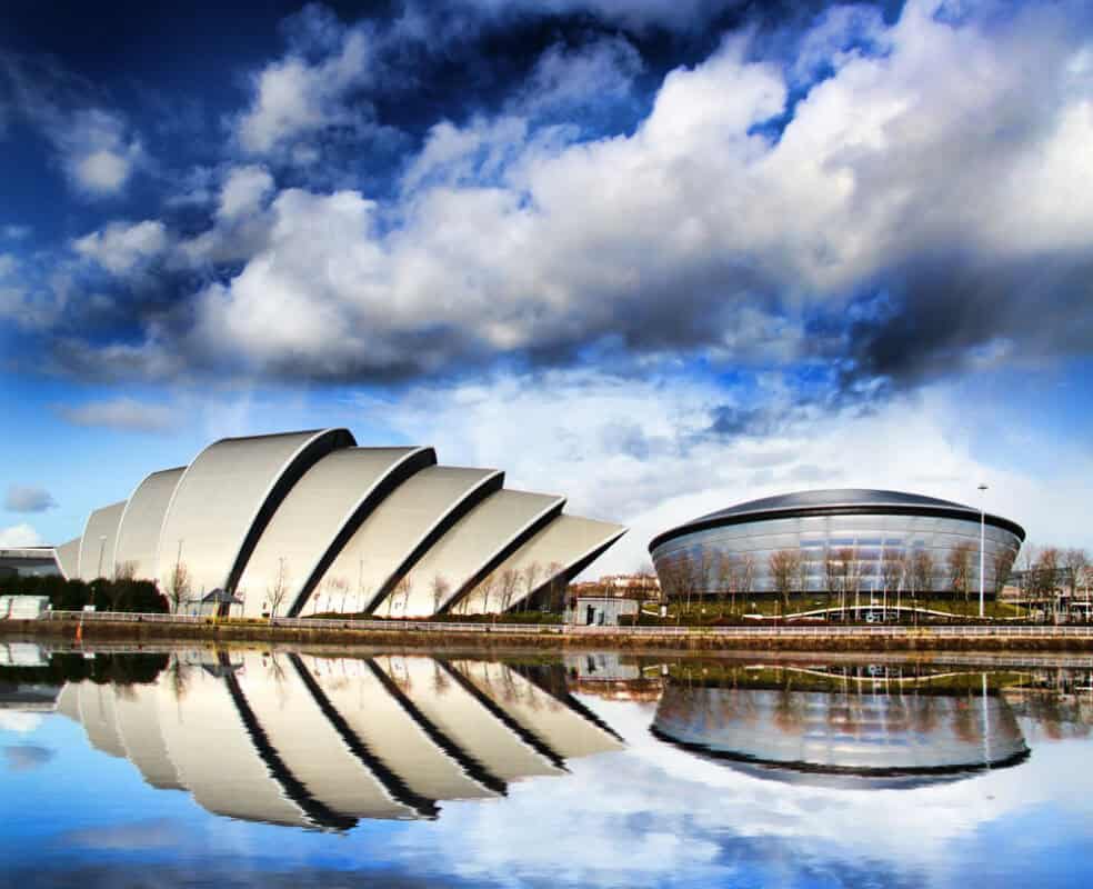 Modern buildings on waterfront with reflections