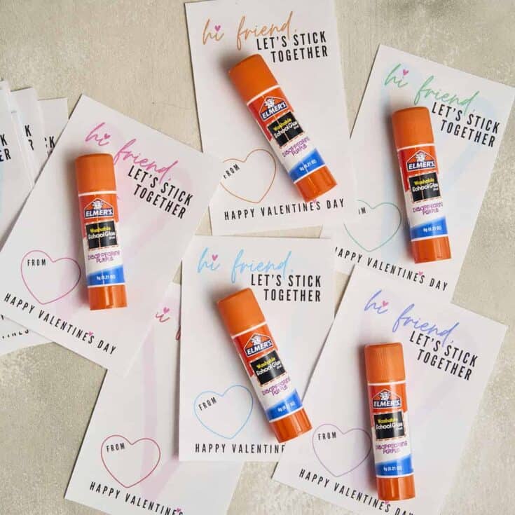 Cards with text on them and a glue stick on each