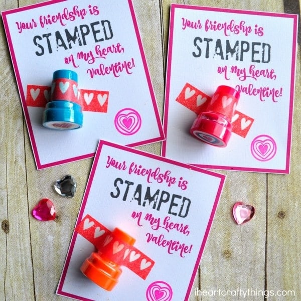 Cards with text on them with stamps taped to them