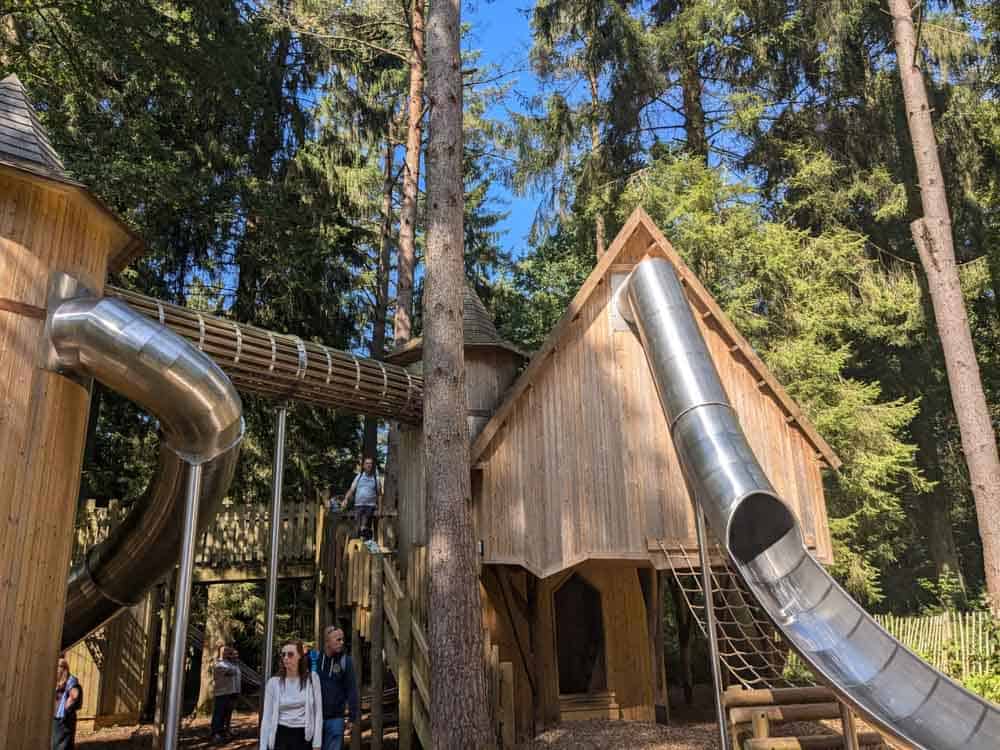 Large wooden playground shaped like a castle