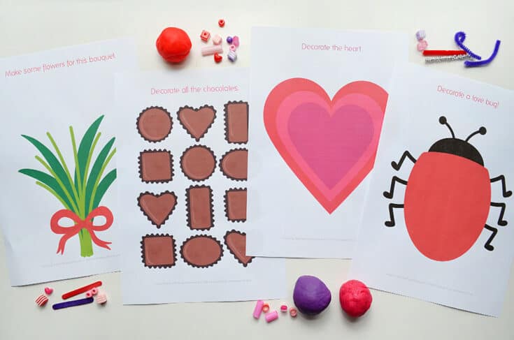 Balls of playdough and printed out sheets with colourful images