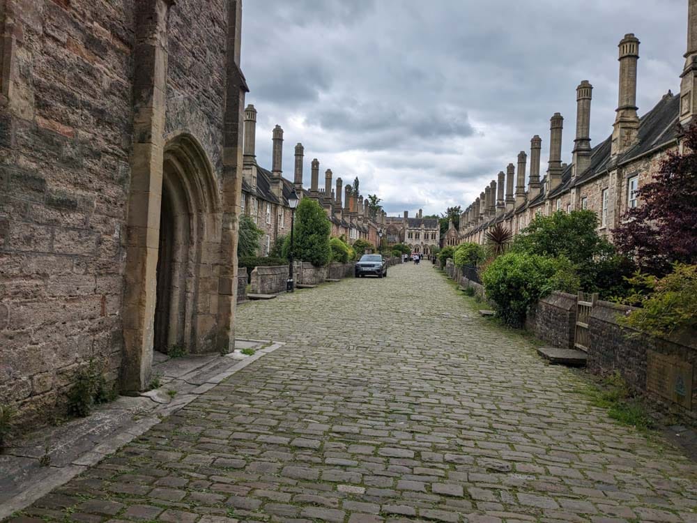 Cobbled stree with stone houses eitherside