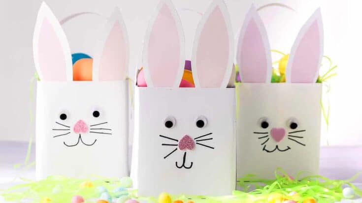 White bokes with Easter bunny faces drawn on and bunny ears