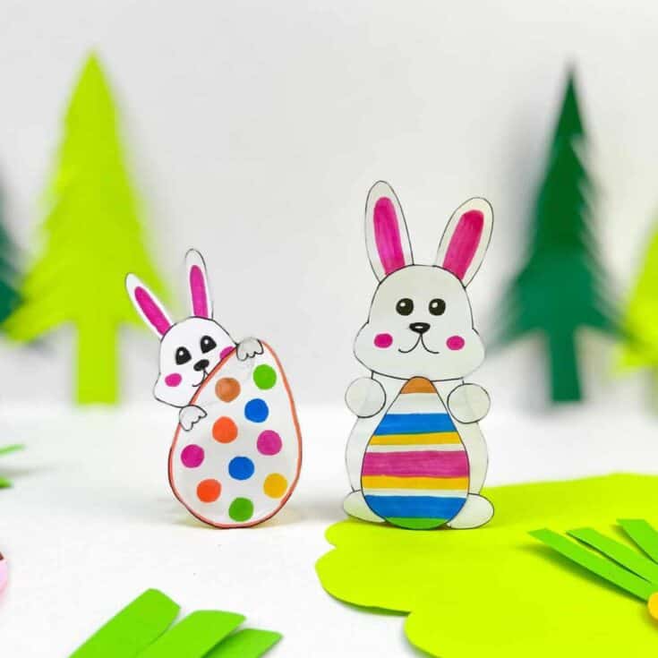 Cute easter bunnies with colourful eggs all made from paper