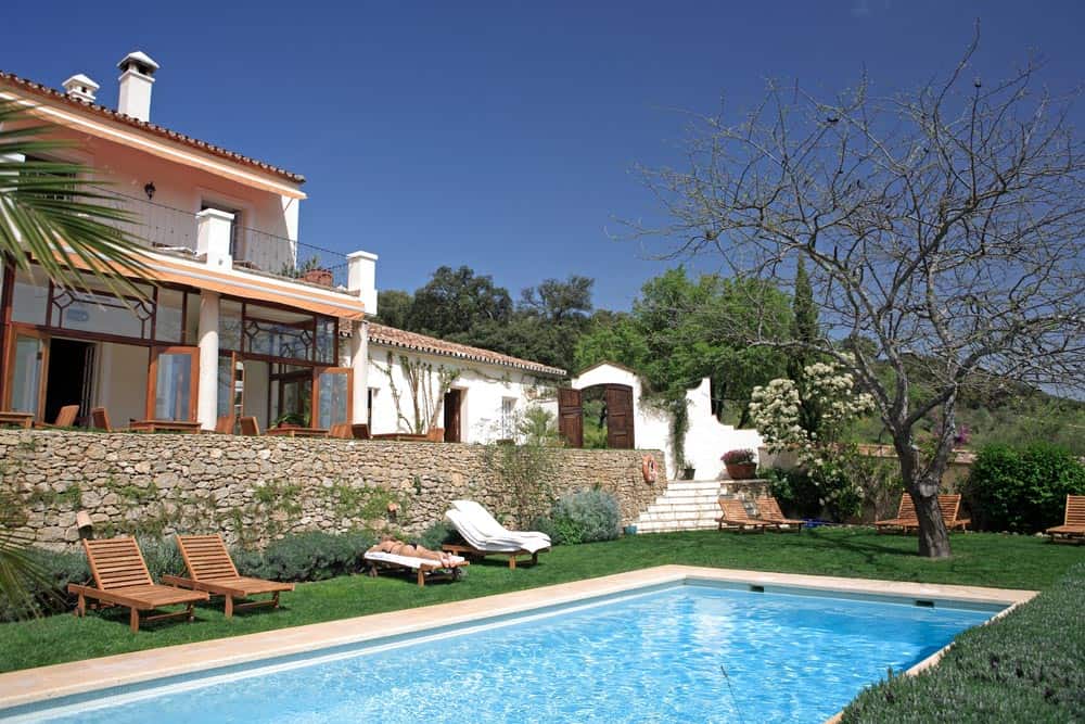 Spanish style villa in blue skies with a pool