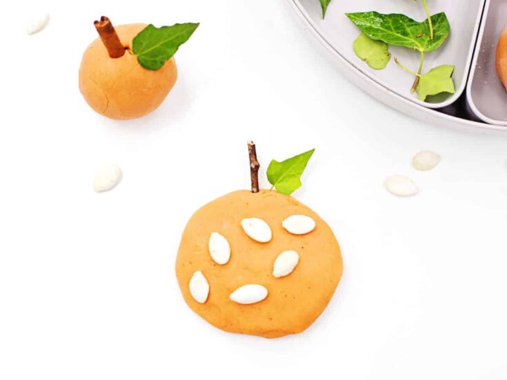 two different pumpkins made from playdough