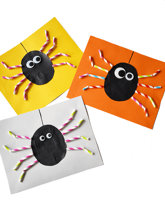 Three craft spiders on yellow, orange and grey paper