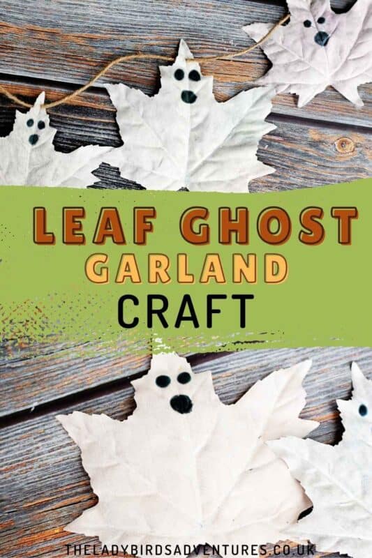 DIY Halloween ghost leaf garland craft made from painted white autumn leaves with black ghost faces, strung on twine with rustic wooden background and text overlay 'Leaf Ghost Garland Craft'