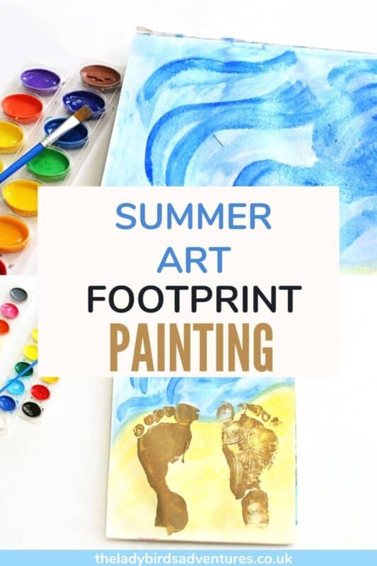 Watercolor paints and brushes sit beside a sheet painted with blue sky and yellow sand tones featuring two gold painted footprints, with the text "SUMMER ART FOOTPRINT PAINTING" and "theladybirdsadventures.co.uk" displayed on the design.